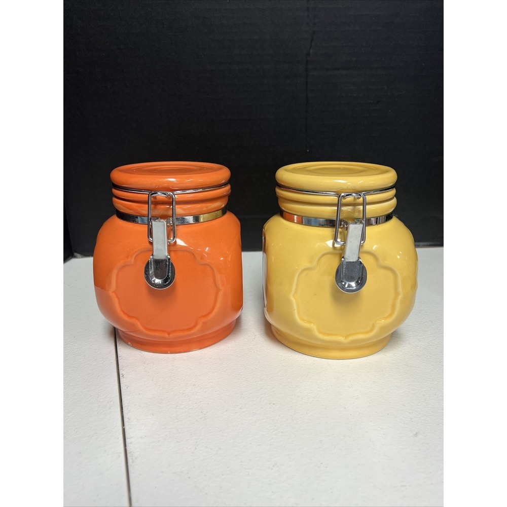Set Of 2 Orange And Yellow Ceramic Jars With Locking Lids